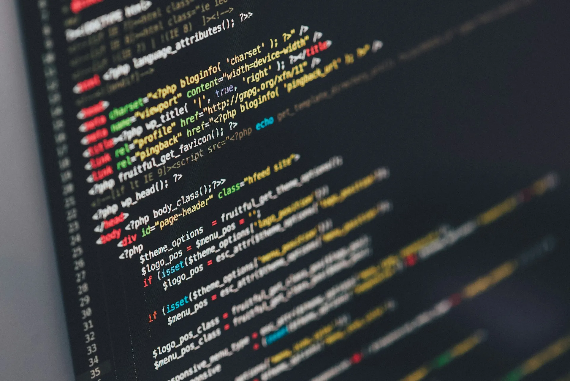 Code on a screen in warm amber tones